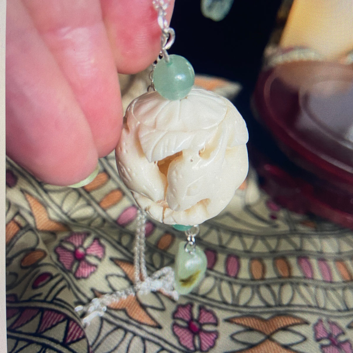 RESTING DEER HAND CARVED PENDENT