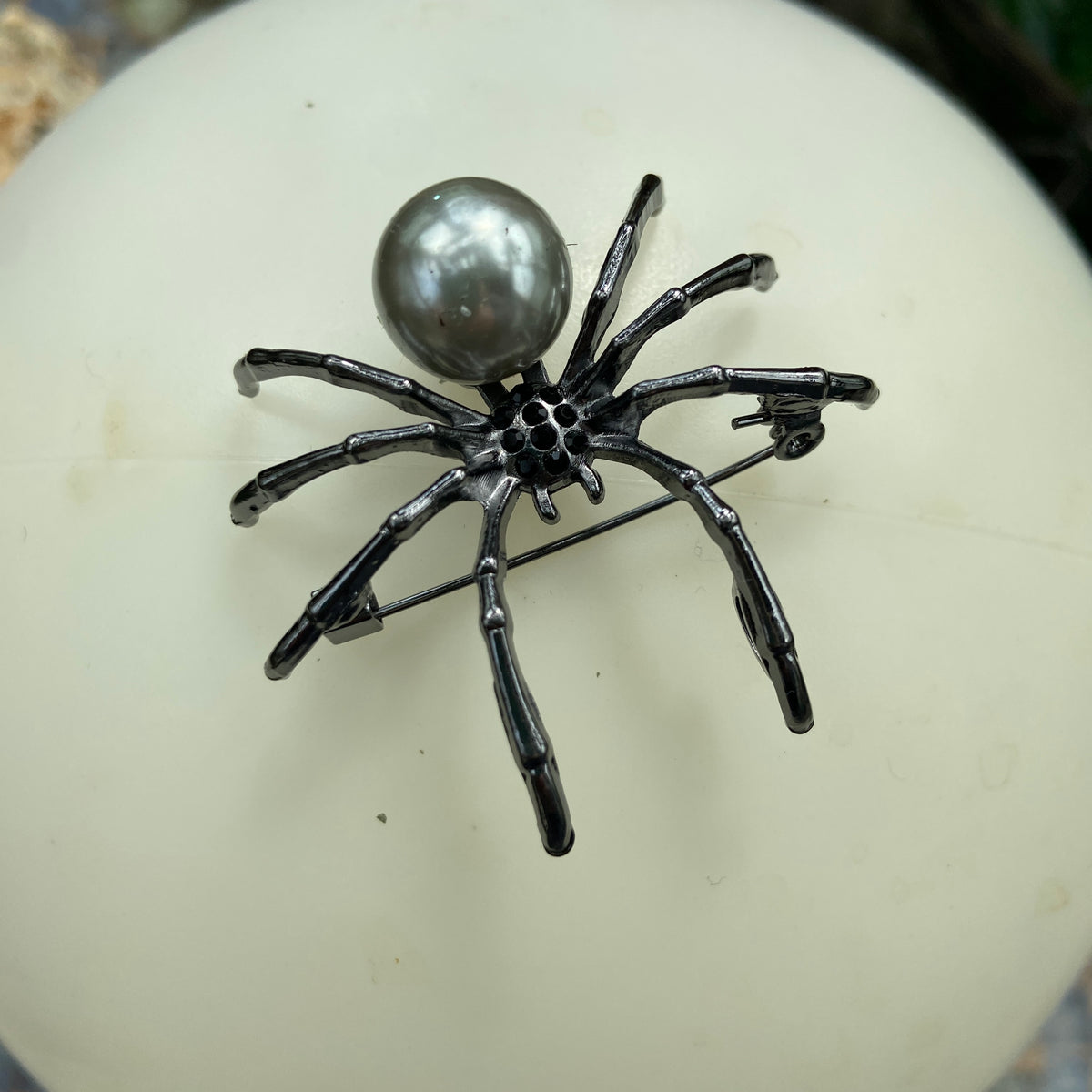 BLACK WIDOW SPIDER PINS.